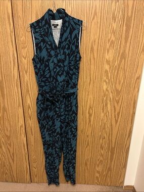 Ann TaylorLOFT Teal Floral Sleeveless Belted Jumpsuit on Black . Size 6